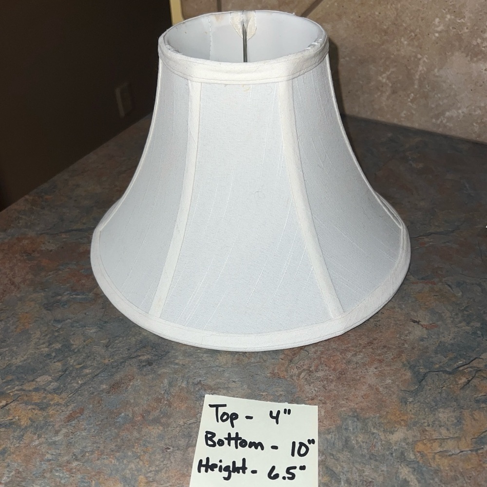 Lovely bell-shaped lampshade.